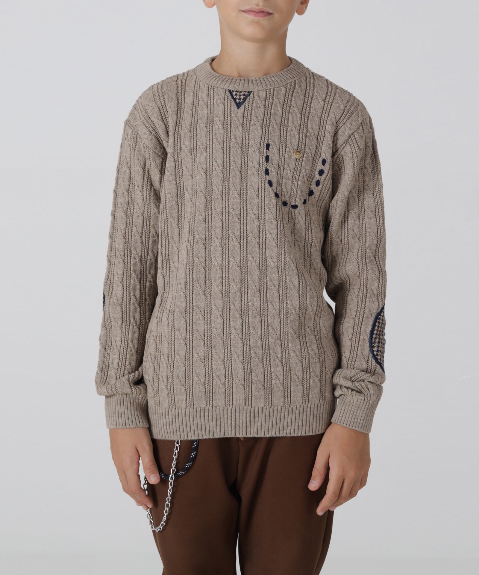 Maglia girocollo con trecce